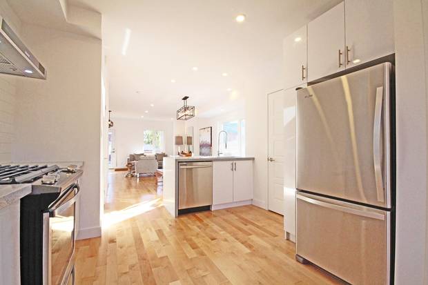 The new kitchen spread out the appliances, which were previously all on one side.