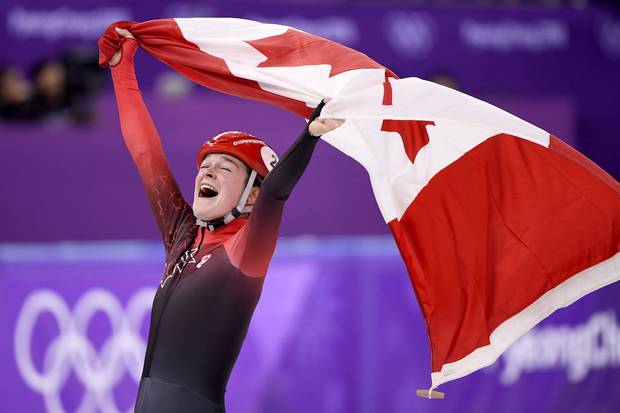 Feb. 17, 2018: Canada's Kim Boutin, of Sherbrooke, Que., celebrates after winning bronze in the women's 1500-metre short-track speedskating at the 2018 Olympic Winter Games.