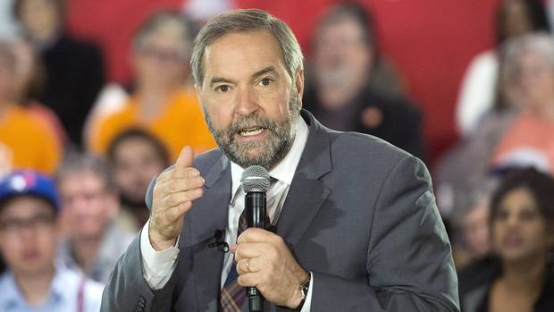 NDP leader Tom Mulcair speaks to supporters a town hall meeting Thursday, October 8, 2015 in Toronto.