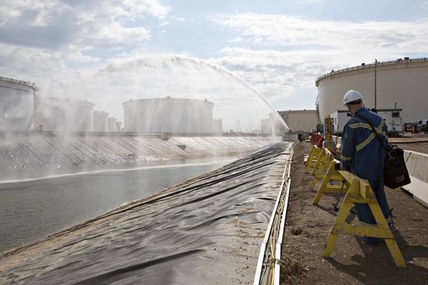 Terminal personnel demonstrate and practice for incident prevention and response for the Trans Mountain Pipeline system in Edmonton June 10, 2015.