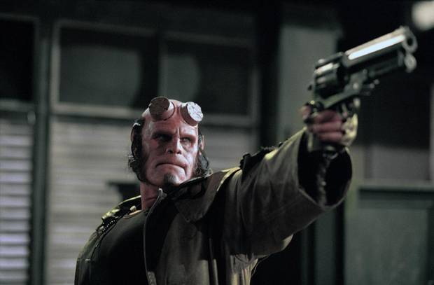 Instead of trying to work with Hellboy director Guillermo del Toro and star Ron Perlman, pictured, the producers decided to start from scratch.