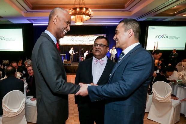 Mr. Hussen shakes hands with John Jung Ko, president of the Korean Canadian Business Association, at the Korean Canadian Women's Association Family & Community Services Arirang Gala in Toronto’s Richmond Hill neighbourhood on Feb. 25.