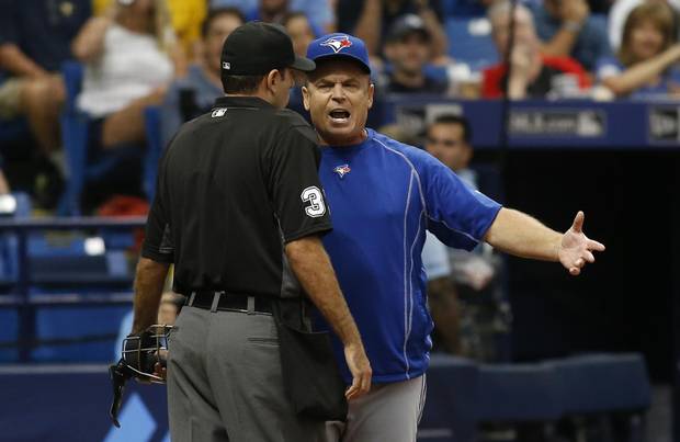 ST. PETERSBURG, FL - SEPTEMBER 4: Manager John Gibbons #5 of the Toronto Blue Jays has a discussion with home plate umpire Pat Hoberg #31 after being ejected from the game by Hoberg during the fourth inning of a game against the Tampa Bay Rays on September 4, 2016 at Tropicana Field in St. Petersburg, Florida.