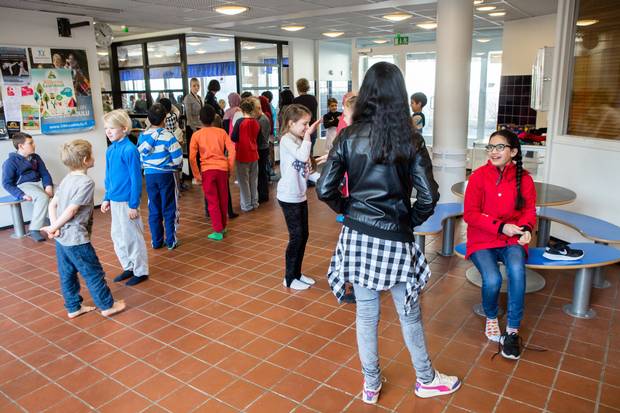 Lara Osman, right, talks with Alina Onno during recess.