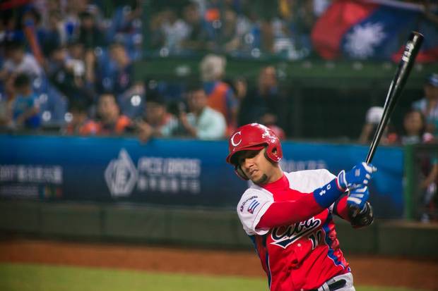 YULIESKI GURRIEL #10 of Cuba plays the WBSC Premier 12 match between Cuba and Taiwan at the Taichung Intercontinental Baseball Stadium on November 14, 2015 in Taichung, Taiwan.