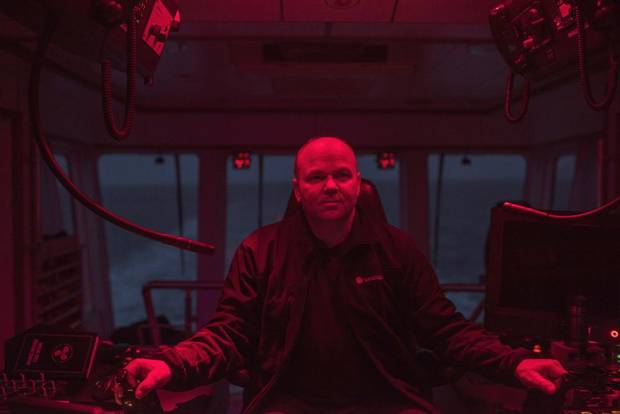 Tug boat captain Werner Klein on the evening shift while escorting the Eser K oil tanker from the Kinder Morgan Westridge Marine Terminal.