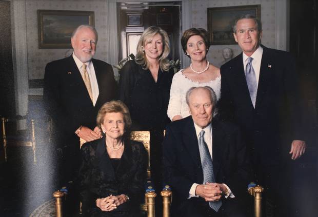 Peter Pocklington and his wife Eva are pictured with former US President Gerald Ford and his wife Betty and George W. Bush and his wife Laura in this undated photo on display at his Palm Springs, California home in June 2017.