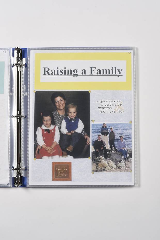 Mr. Crosbie’s family is shown in a page from a binder chronicling his life.