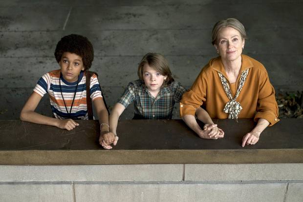 Jaden Michael, Oakes Fegley, and Julianne Moore in Wonderstruck.
