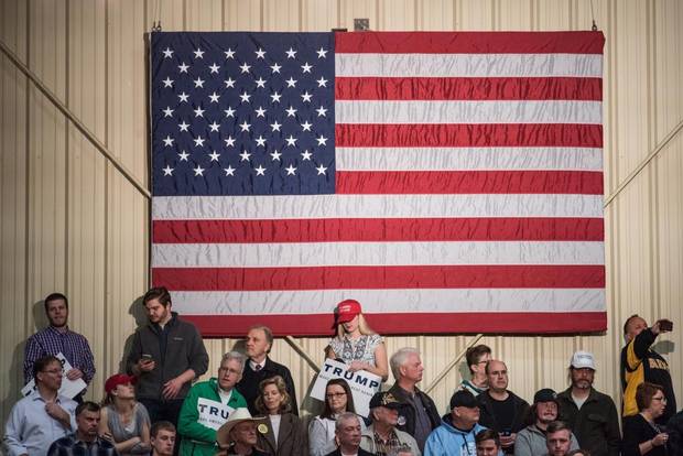 Trump supporters wait for the arrival of their candidate at a campaign rally March 7 in Concord, North Carolina.