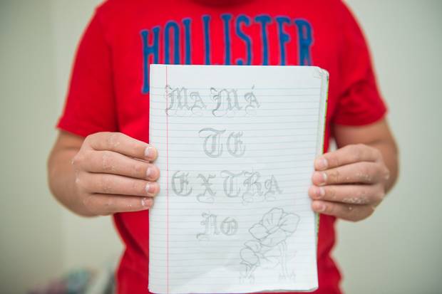 One of Fernando’s drawings reads: ‘Mom, I miss you.’ His notebook is filled with grafitti-inspired images and cartoons written to his mother and girlfriend back in El Salvador.
