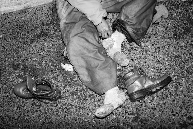 Omar and his companions trekked through heavy snow, away from roads to avoid detection.