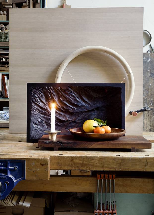 Earnshaw has begun to broaden her focus to include smaller objects like carved trays and cast brass candle holders.