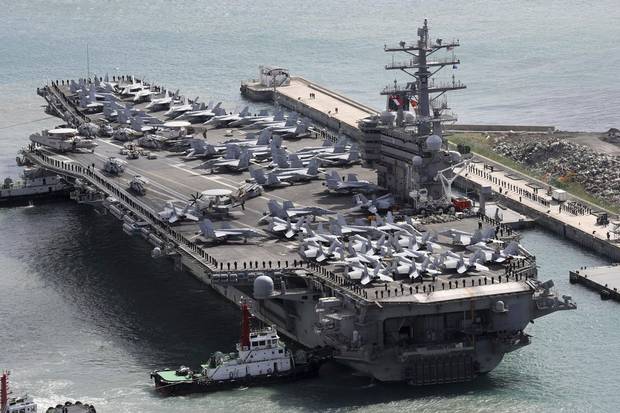 Oct. 21, 2017: The aircraft carrier USS Ronald Reagan is escorted into the South Korean port of Busan after completing a joint drill with the South Korean military. Last fall, the South Koreans held joint naval exercises with three carrier groups: the Ronald Reagan, Theodore Roosevelt and Nimitz. In the event of an American first strike on the North, attacks would come as much as possible from naval assets and military bases outside the theatre of operations.