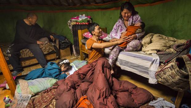 Munkhtuul family in Ulan Bator's Ger district. The family makes a living by hunting for recycling at the local dump to sell. The dump is also a source of fuel for the their stove which is also used to heat their home.