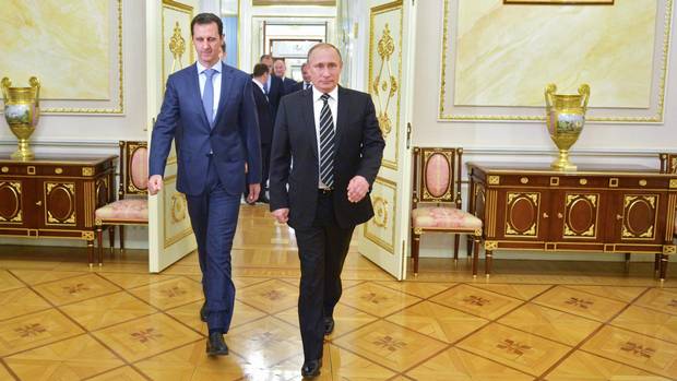 Russian President Vladimir Putin, right, and Syrian President Bashar al-Assad. Justin Trudeau inherits a government that has put some noses out of joint with pugnacious pro-Israel and pro-Ukraine stances under Stephen Harper.