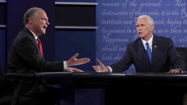 Democratic vice presidential nominee Tim Kaine, left, and Republican vice presidential nominee Mike Pence speak during the vice presidential debate on Oct. 4, 2016, in Farmville, Va.