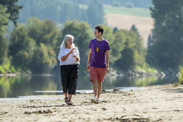 Rosalind Williams walks with her grandson Aaron Leon Williams along the shore line of the Shuswap River in Enderby, B.C. on Monday August 21, 2017.