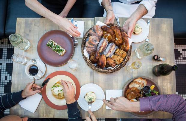 All hands on deck for the poached eggs with smoked pork belly, fromage blanc tartine and buttermilk and ricotta pancakes.