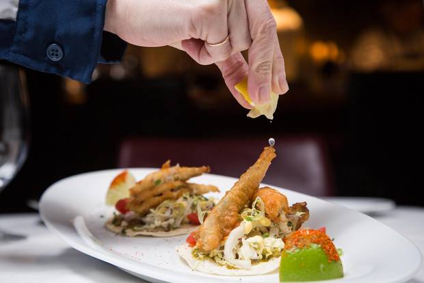 The Blue Water Café + Raw Bar’s smelt tacos, with smelt deep-fried in a golden beer batter so the silver skin and tiny bones melt away to mildly briny tenderness, are a terrific example of executive chef Frank Pabst’s fun factor.