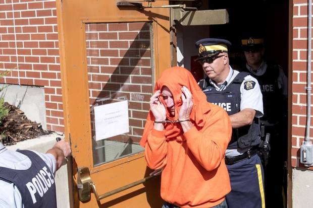 Gerald Stanley leaves in custody after his bail hearing in North Battleford, Sask. on Aug. 18, 2016.