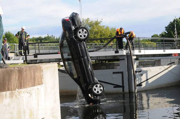 A court-released photo from the Shafia trial shows authorities hauling a car from Kingston’s Rideau Canal locks on June 30, 2009. Three sisters and their stepmother were drowned in the car; the girls’ father, his wife and their son were found guilty of murder. The complex Shafia case put a strain on Kingston’s court system that, along with bureaucratic errors, delayed the sex-assault case against Kenneth Gavin Williamson.