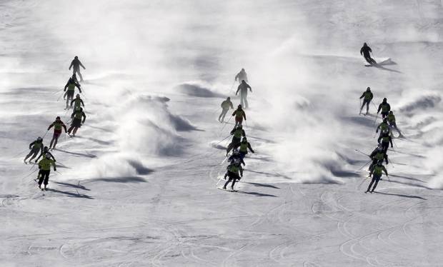 South and North Korean skiers attend their joint training at the Masik Pass ski resort in North Korea, Thursday, Feb. 1, 2018. North Korean skiers and skaters on Thursday arrived at a South Korean airport to participate in the Winter Olympics that has brought a temporary lull in tensions surrounding their country's nuclear program. (Korea Pool/Yonhap via AP)