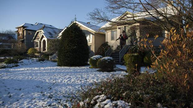 Linda Ren, right, and her mother, Sophie Li visit their home they were recently renting out in Vancouver, British Columbia, Wednesday, December 7, 2016. Rafal Gerszak/The Globe and Mail