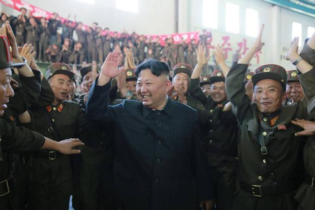 North Korean leader Kim Jong Un reacts with scientists and technicians of the DPRK Academy of Defence Science after the test-launch of the intercontinental ballistic missile Hwasong-14 in this undated photo released by North Korea's Korean Central News Agency (KCNA) in Pyongyang.