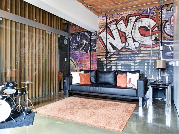 The kids use the recreation room as a spot to practise the drums.
