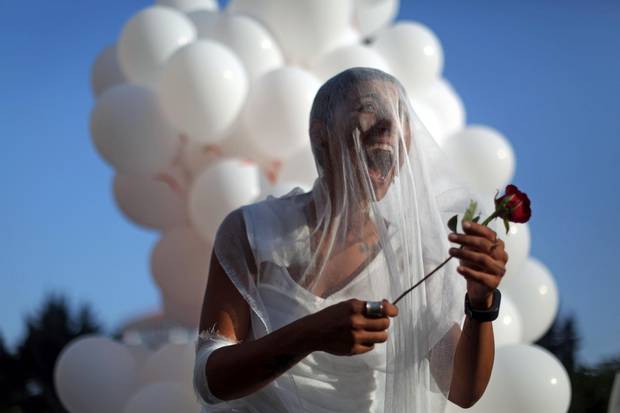 An activist celebrates in Beirut on Aug. 17, 2017, after the abolishment of the article 522 in the Lebanese code, which shields rapists from prosecution on the condition that they marry their victim.
