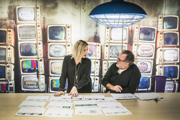 Jennifer Dodge and Jamie Whitney looks over storyboards for their show Abby Hatcher at the Spin Master office in Toronto.