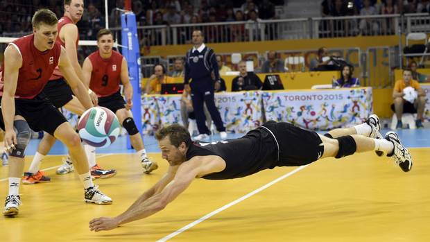 Canadians in action against the USA in men's volleyball at the Toronto 2015 Pan Am Games.