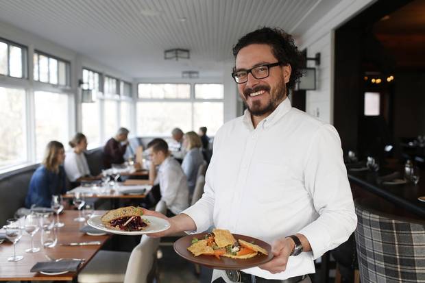 Server Chris McKinnon during the lunch rush.