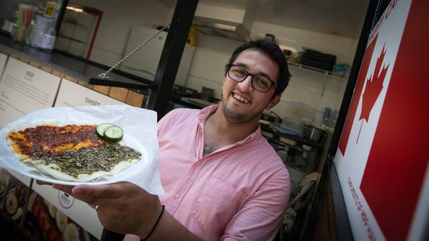 Beroea menu items include a flatbread called Manúshe, which comes in several varieties such as Zaatar, with a number of traditional toppings including dried thyme, sumac and sesame seeds mixed with olive oil, and Mouhamara, with Aleppo's original sweet red pepper paste. (It can also be made as a half-and-half, as seen here.)