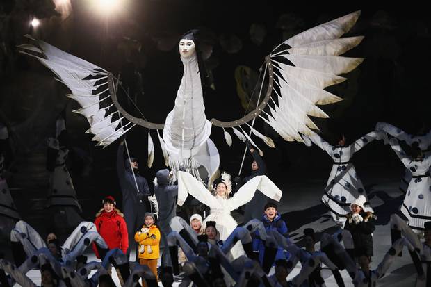 Feb. 9, 2018: A giant winged creature with a human face looms over the children and dancers in the opening ceremonies’ ‘Land of Peace’ segment.