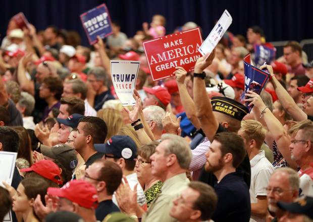 Supporters cheer at Mr. Trump’s campaign event in Phoenix.