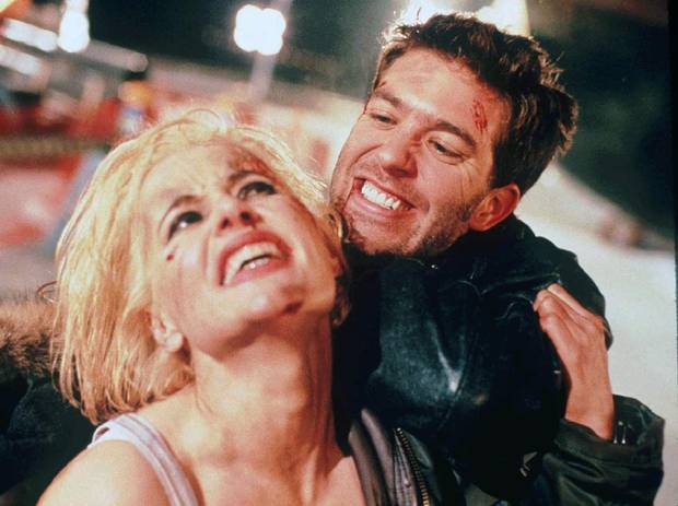 Geena Davis and Craig Bierko in Long Kiss Goodnight.