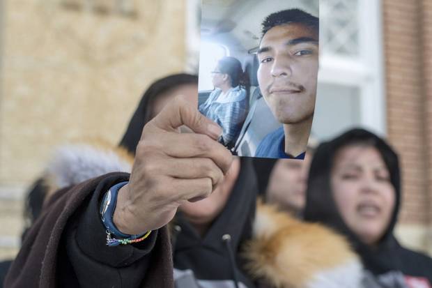 Feb. 5, 2018: Debbie Baptiste, the mother of Colten Boushie, holds up a picture of her son as she leaves court in Battleford, Sask., on a lunch recess on the fifth day of the trial of Gerald Stanley, the farmer accused in Mr. Boushie’s death. Mr. Stanley was acquitted four days later.