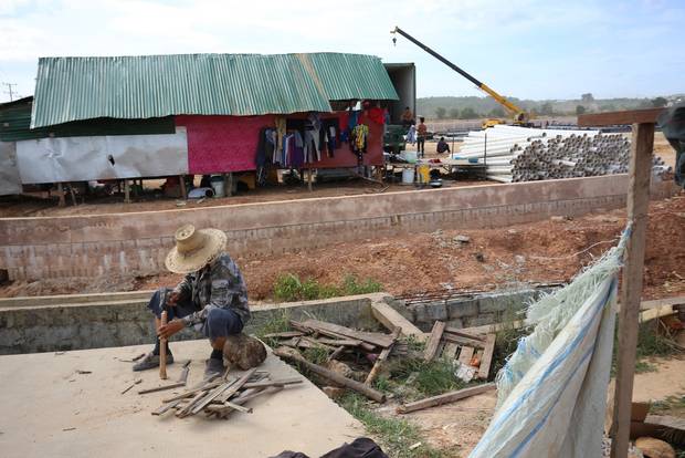 Construction workers build new factories in the 11-square kilometre Sihanoukville Special Economic Zone, one of China’s most visible investments in Cambodia.