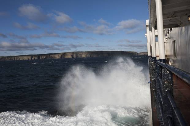 Bell Island is visible in the distance as the MV Flanders ferry crosses over from Portugal Cove.