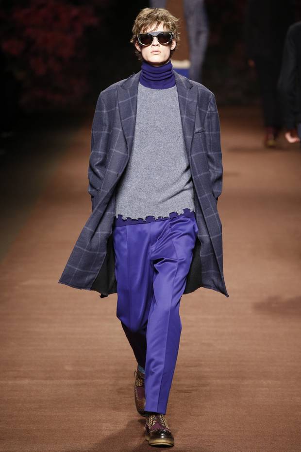 Etro’s frayed-hem sweater makes a dapper ensemble fashionably tatty.