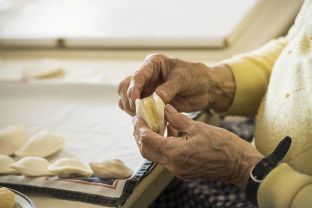 The Perogy Pinchers prepare perogies in the basement of St. Gerard Parish in Winnipeg on Wednesday, Nov. 29, 2017.