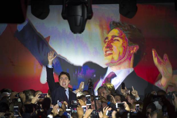 Justin Trudeau waves to supporters on election night in Montreal on Oct. 20, 2015.