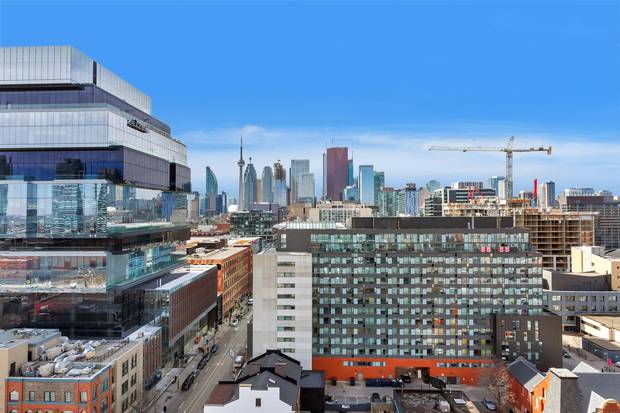The outdoor terrace offers views of the CN Tower and Lake Ontario.
