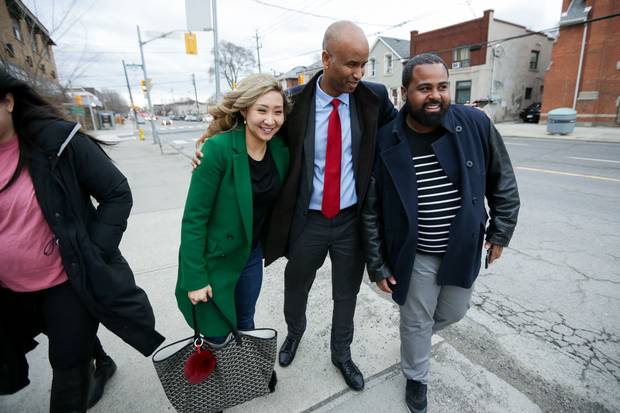 Mr. Hussen gives staffers Christine Whitten and Jordan Wilson encouragement for a job well done on their tour of York South-Weston.
