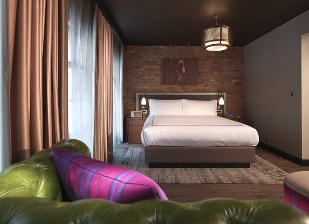 Suits at the Curtain have an industrial but warm feel.