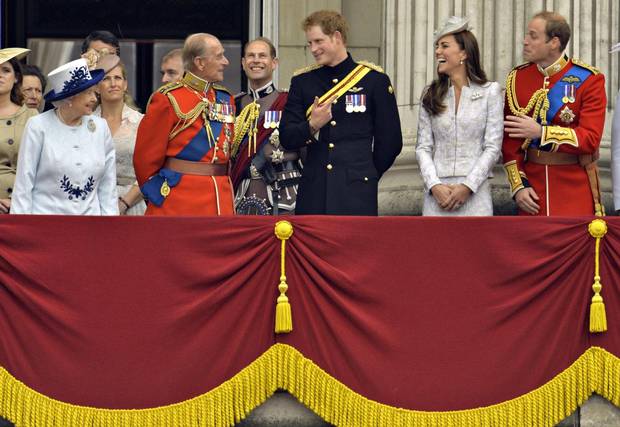 The Queen, Prince Philip, Prince Harry and William and Catherine, Duke and Duchess of Cambridge, stand on the balcony of Buckingham Palace in the annual Trooping of the Colour ceremony on June 14, 2014.