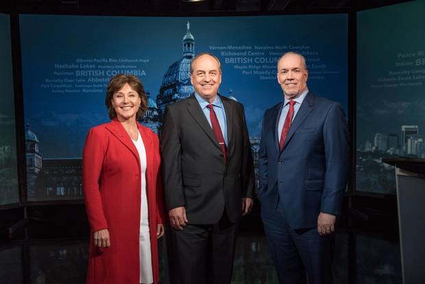 Weaver, centre, is flanked by BC Liberal Leader Christy Clark and B.C. NDP leader John Horgan at an election campaign debate on April 26, 2017.