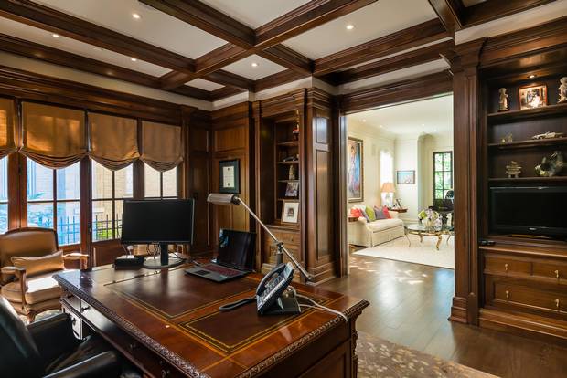 Mr. Vanneste's home office is lined with walnut.